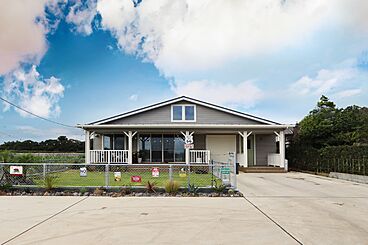 株式会社 WOODY HOUSEの施工事例「インナーガレージとつながるLDKのアメリカンハウス|36坪」の画像