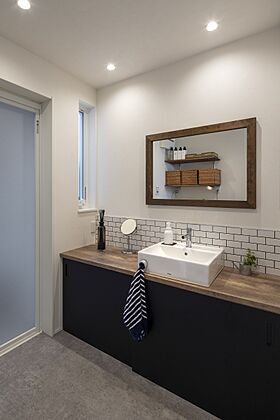 株式会社タイコーアーキテクトの施工事例「アイランドキッチンを中心に空間の広がるスキップフロアのある家」の画像5