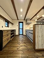 木の家スタイルのキッチン ナカムラハウス 光展示場の事例画像