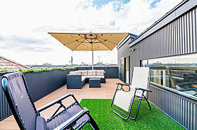 アーキテックス (GROOVY/KANAL HOME/SIMPLE is.../dramacy)の施工事例「【西尾市】ガレージに屋上バルコニーでBBQも!仲良し2世帯6人で住む2階建て」のメイン画像