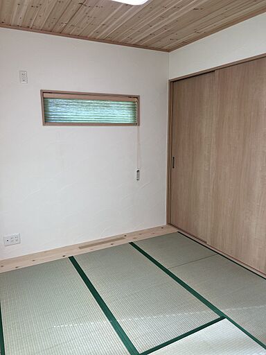 株式会社ハザマ住建の施工事例「統一感あるグリーンカラーと無垢材が織りなす、こだわりの住まい」の画像6