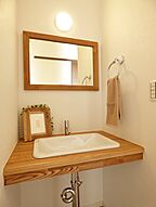 シンプルモダンスタイルの洗面所 リバウスホームの事例画像