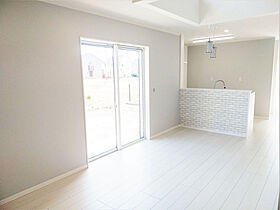 株式会社上村工務店の施工事例「どこからでも声が届く吹き抜けのある家(伊勢市)」の画像1