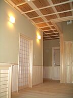 木の家スタイルの玄関 Reset 安堵 Relax エアブレスの家の事例画像