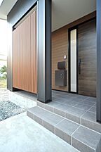 ホテルライクスタイルの玄関 有限会社 高健工務店の事例画像