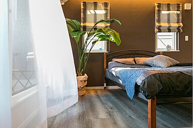 シュガーホームの施工事例「風と光を感じる大開口窓と吹抜けの家」の画像4