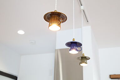 サンワ設計株式会社の施工事例「吹抜けとスキップフロアの大空間リビング 見せない工夫が魅せるナチュラルな家」の画像5